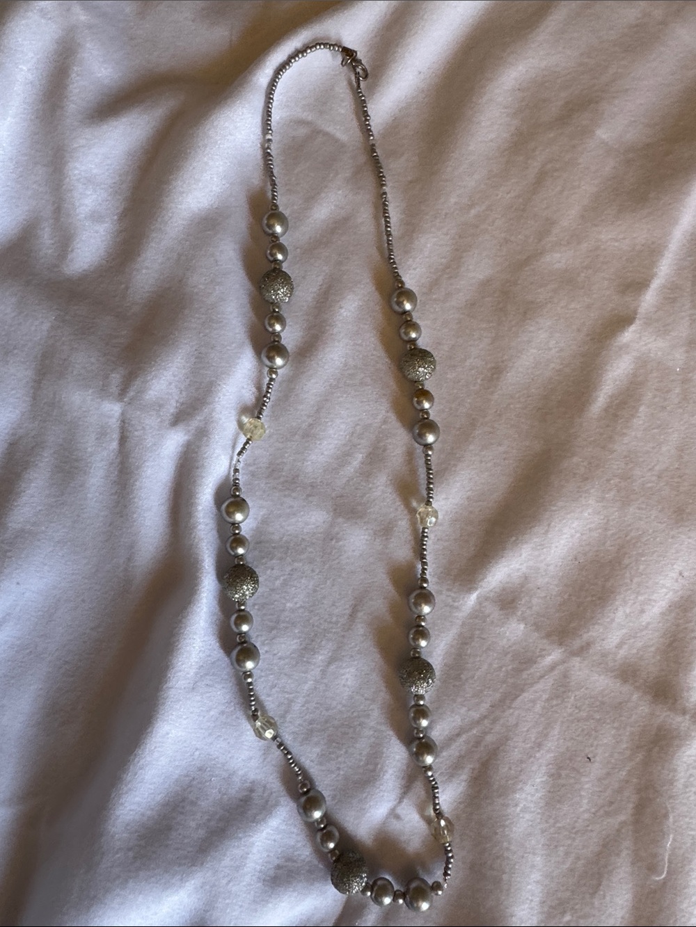 Long Silver Beaded Necklace with Textured Accent Beads